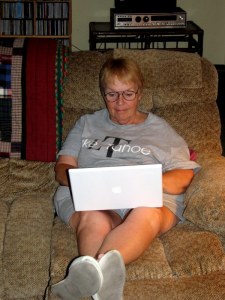 BetsyMacbook09081001 Betsy using her new MacBook. August 9, 2009.