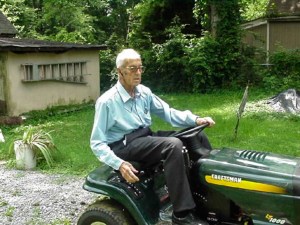 Dad and his riding lawn mower.  Hendersonville, Tennessee.