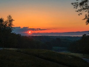 Good Morning World! The sun popping over the mountains. May 4, 2016.